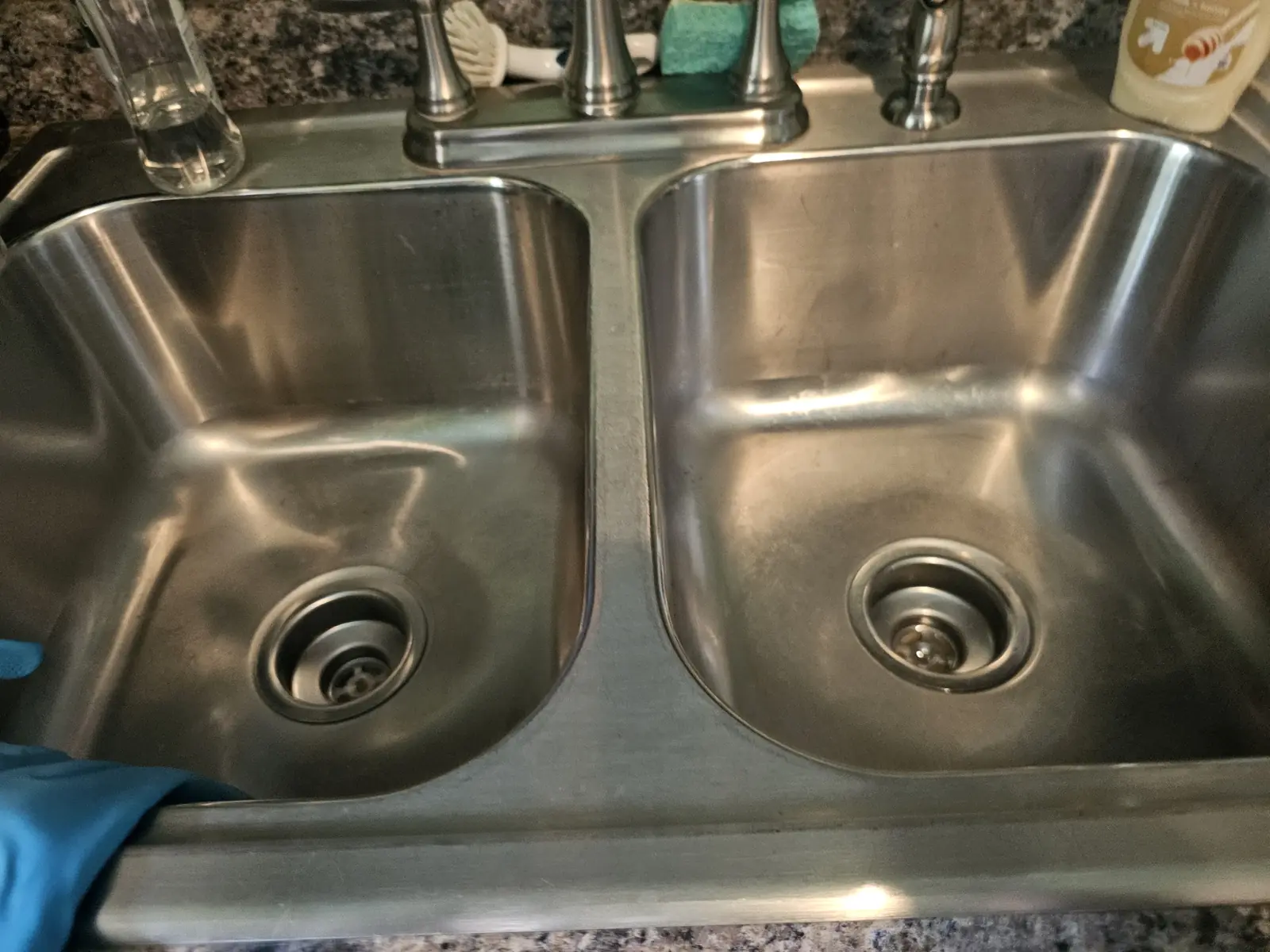 Stainless double kitchen sink after a drain repair